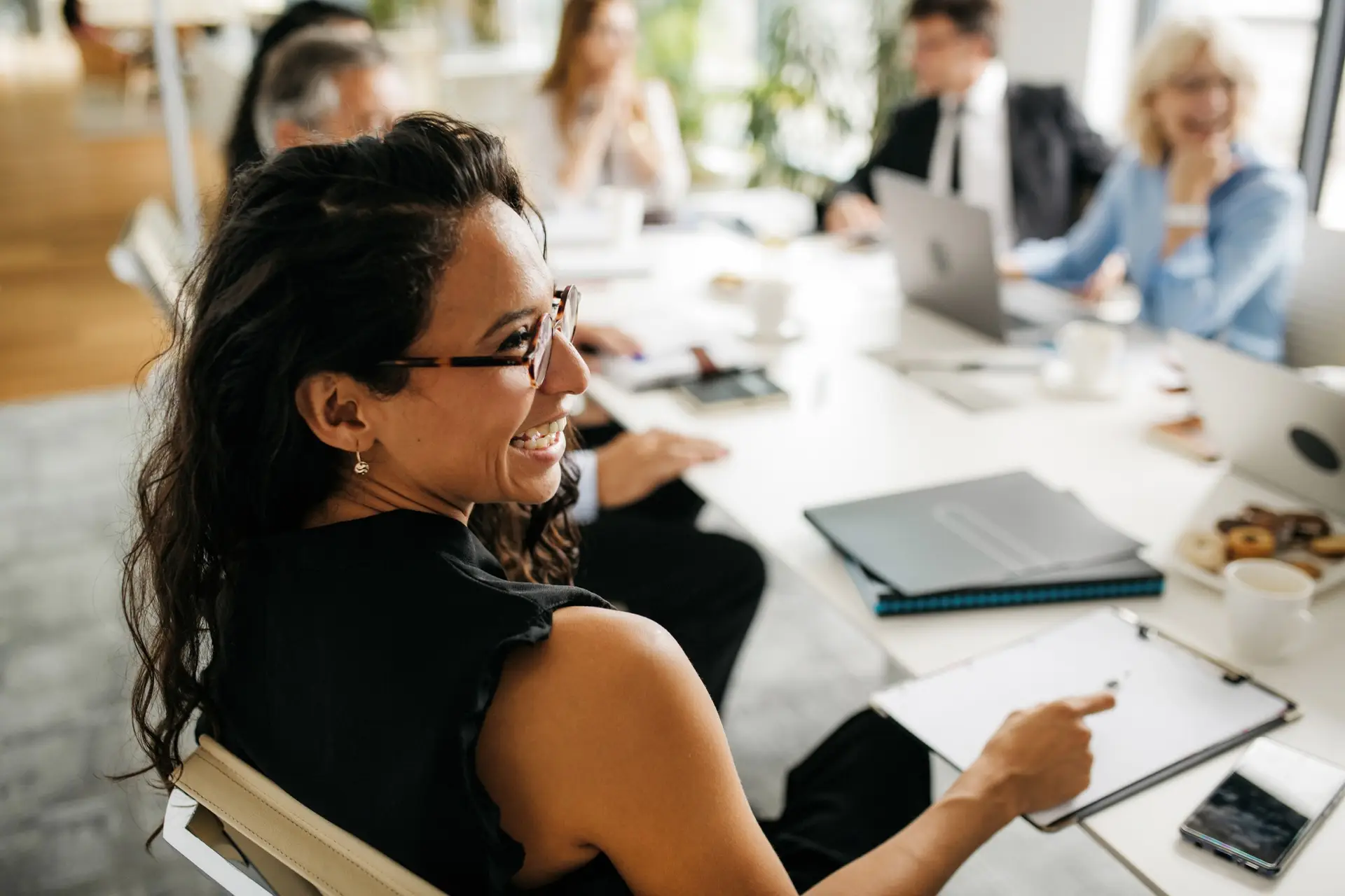 A marketing strategist reviewing leasing performance in a working session